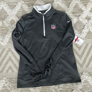 Women’s NFL Nike Golf Quarter Zip long sleeve pullover (with logo on right arm)